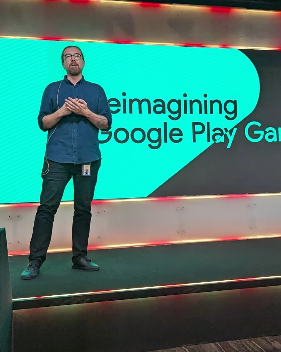 Marcin Treder speaking on stage at Google Play Playtime